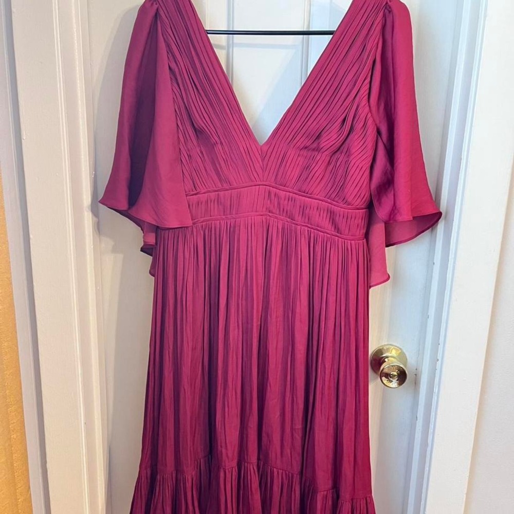 Burgundy mini dress with ruffles and V-neck